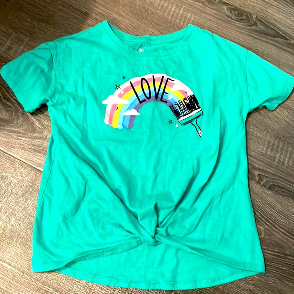 This is a rainbow t shirt for girls very stylish and new